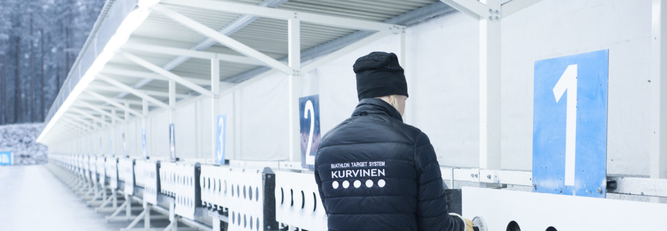 Biathlon Target System Kurvinen's team member at target boards checking the equipments